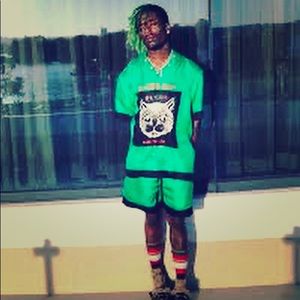 Green,black shirt shorts